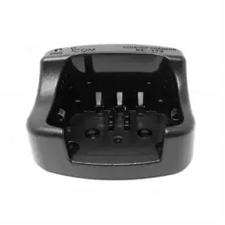 Black desktop battery charger with two battery slots and metal contacts on a white background.