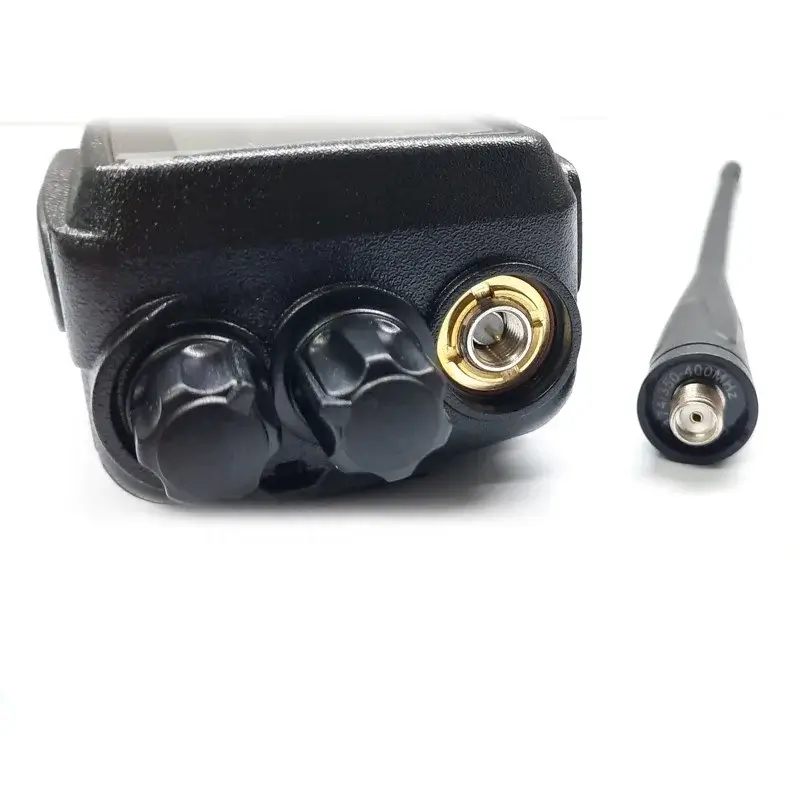 Alinco DJ-MD6 | Rakomindo Close-up of a black two-way radio microphone base with two knobs and a gold connector, plus a detachable plug-in cable.