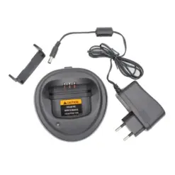 Circular battery charging cradle with wall adapter and slot for rechargeable battery